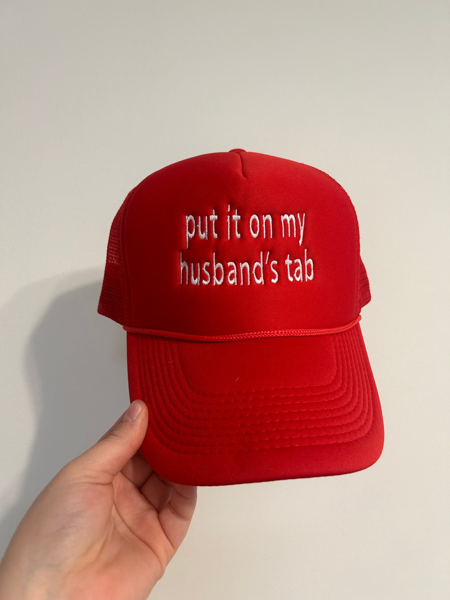 put it on my husband’s tab trucker hat